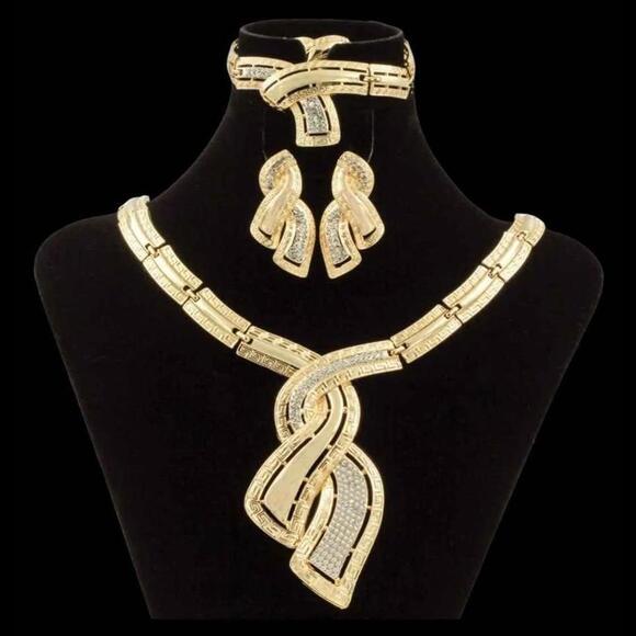 Gold Tone and Clear Stones Necklace, Bracelet, Earrings, and Adjustable Ring Set - Picture 1 of 9